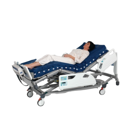 A patient lying on a bed with Nimbus Professional Mattress